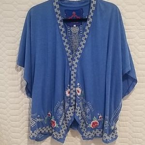 Johnny was sweater / poncho